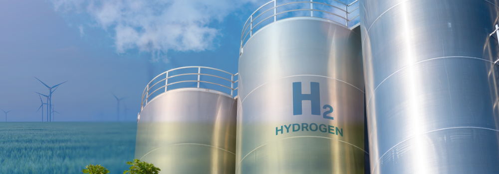 Decorative image of Hydrogen towers and wind turbines